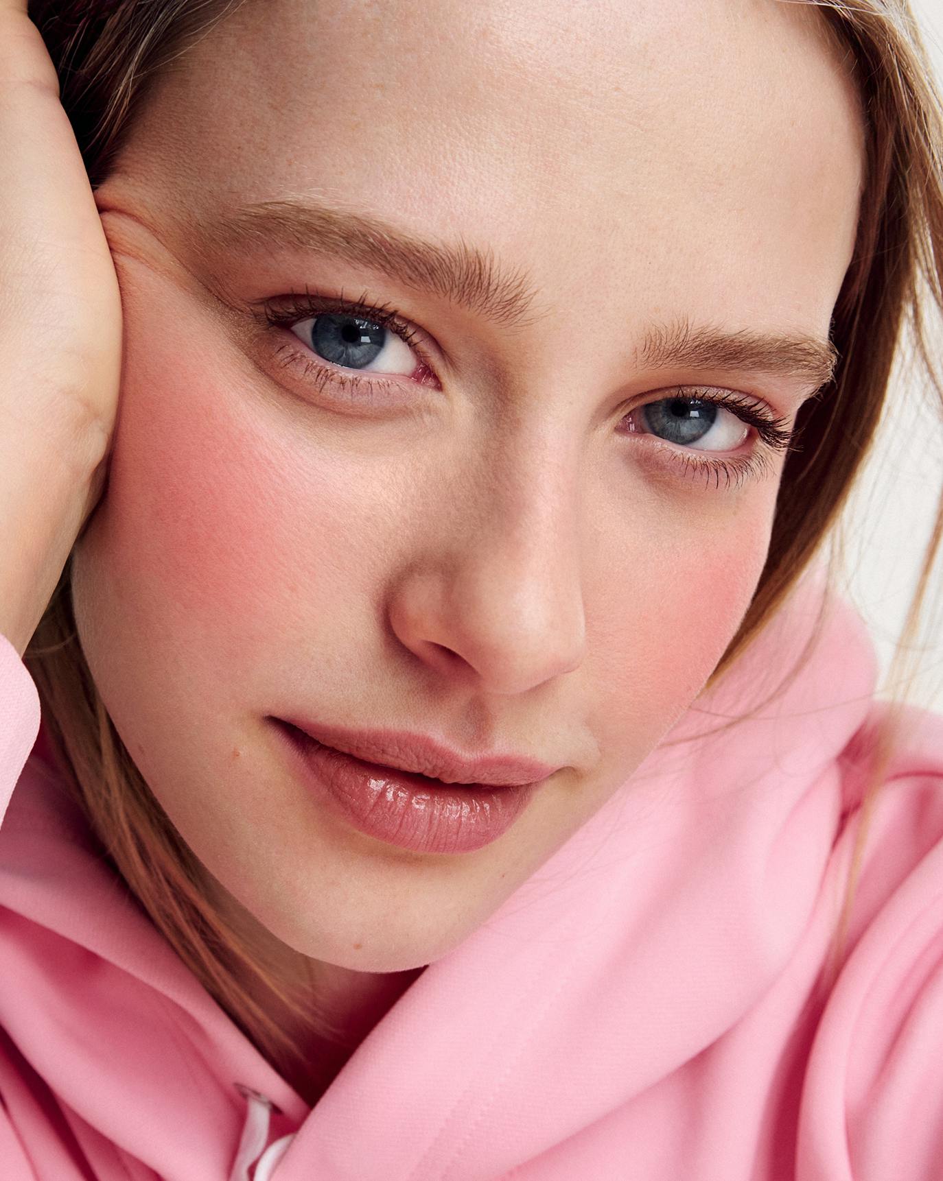 Tia wears Cloud Paint Plush Blush in Puff.